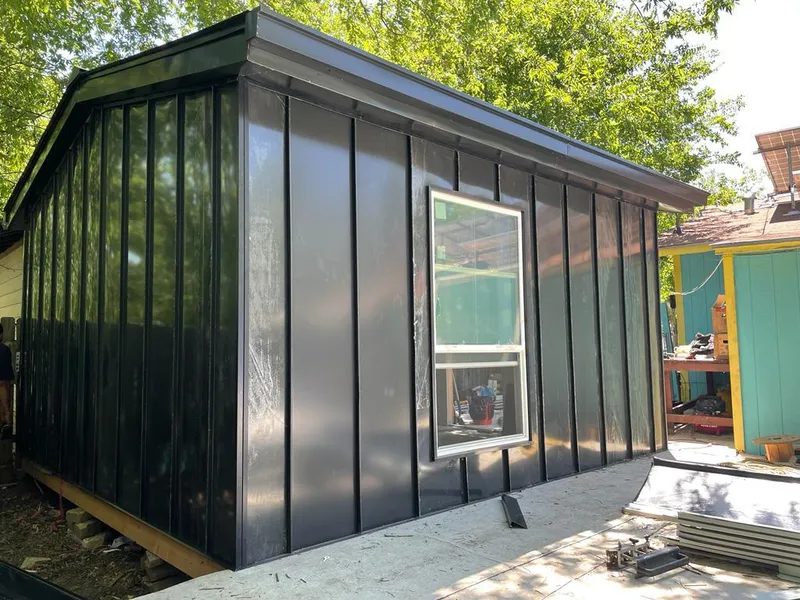 Black standing seam metal wall panels for Roof Inspection in Spotsylvania Courthouse