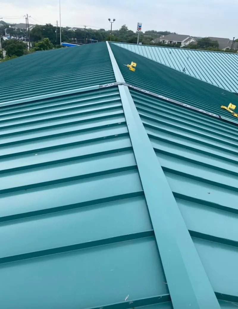 Green commercial metal roof ridge and valley for Metal Roof Repair in Spotsylvania Courthouse